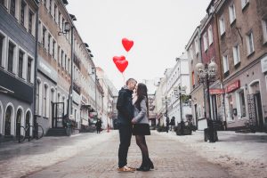 Couple kissing in the middle of the street