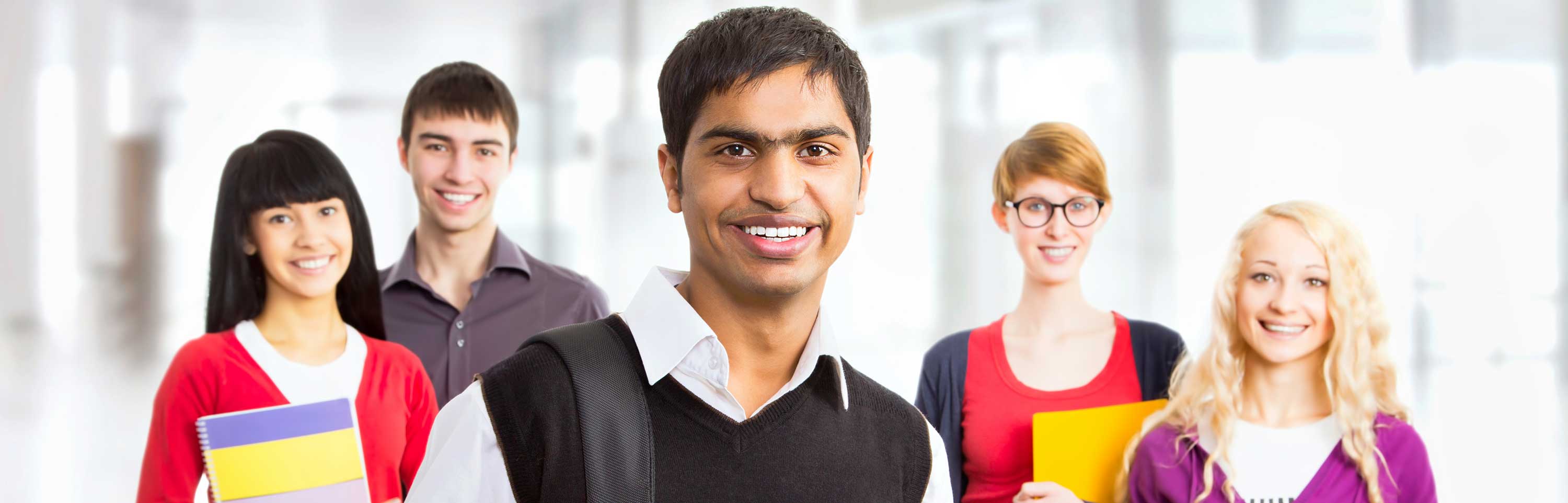 Young adults smiling at the camear